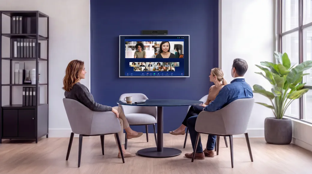 People in a meeting framed by the Texo Bar